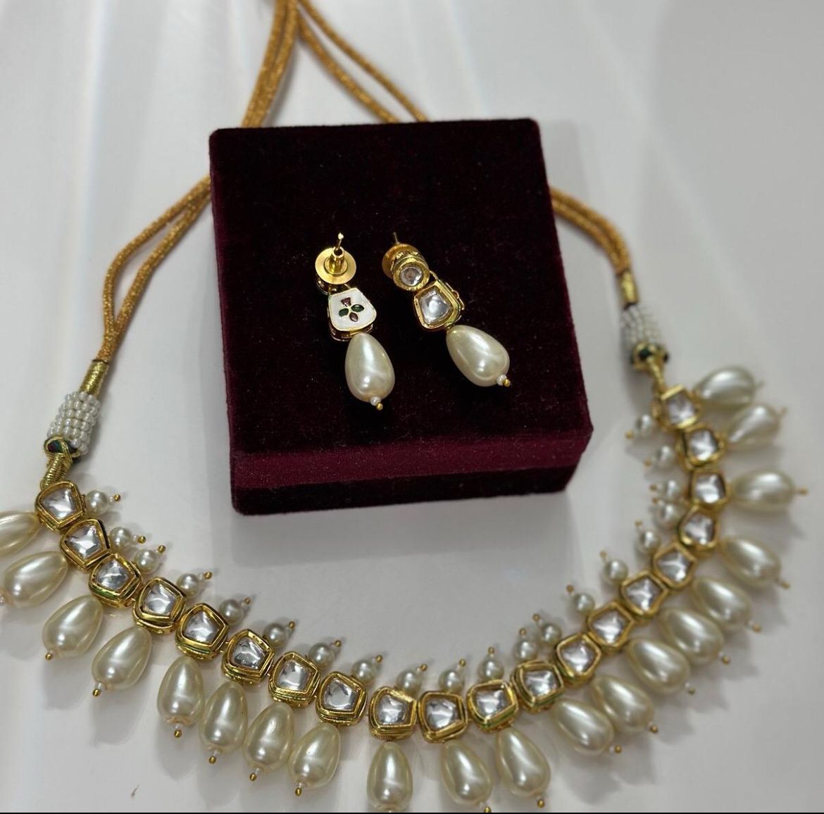 White pearl style necklace set with earrings